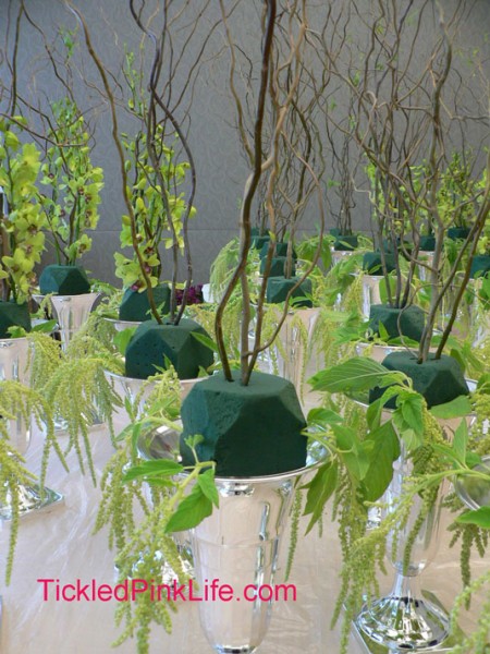 table arrangement preparation-inserting amaranthus and curly willow into oasis