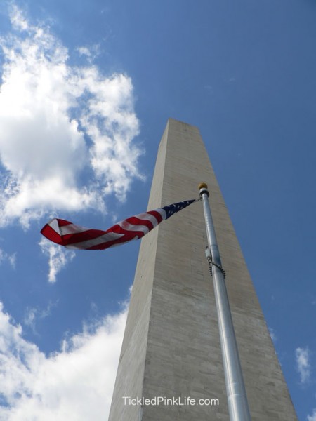 Washington Monument with American flag-celebrating the fourth of July